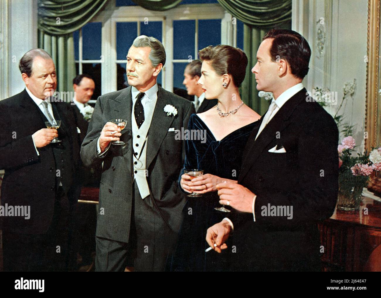 MACGINNIS,REDGRAVE,REDGRAVE,BRITTON, BEHIND THE MASK, 1958 Stock Photo