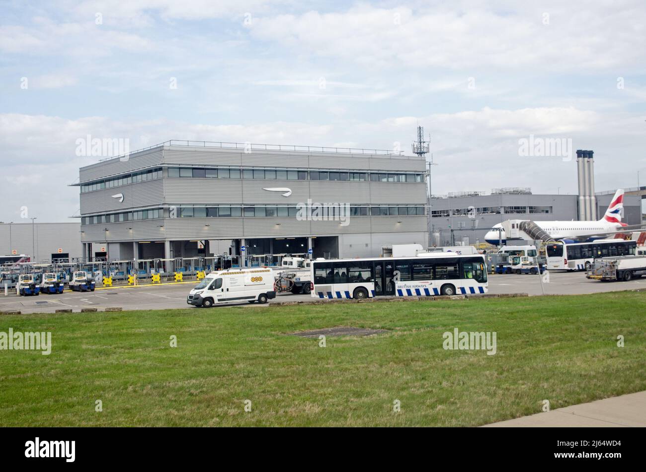 London, UK - April 19, 2022: Offices of British Airways at Terminal 5 of London's Heathrow Airport on a sunny, summer morning. Stock Photo