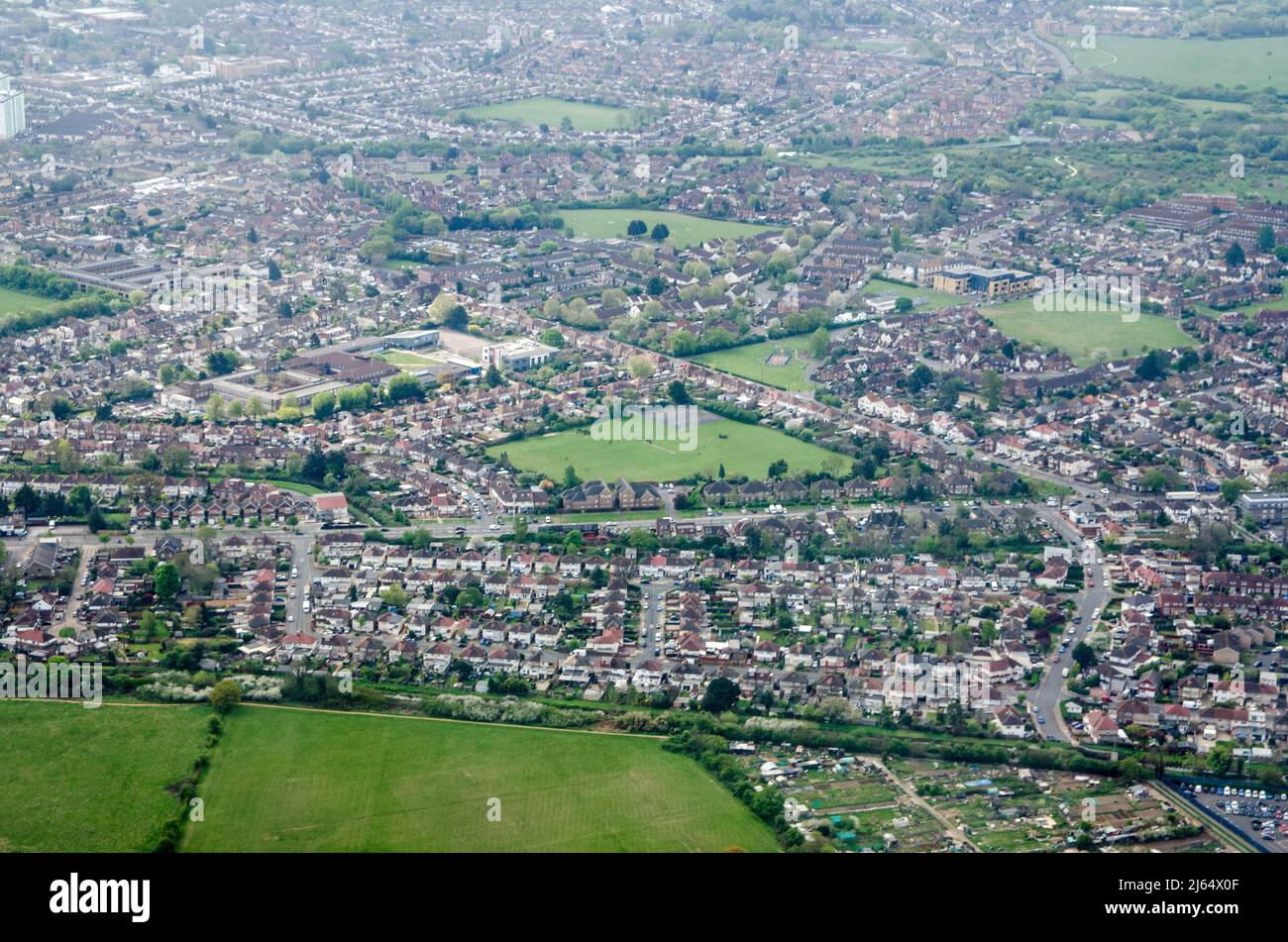 View from above of the London suburb of Feltham.  Towards the centre are the Feltham Arenas Parklands with various sport facilities and towards the le Stock Photo