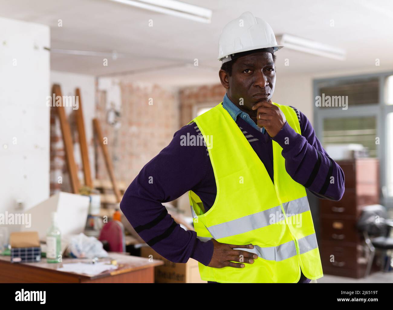 African american inspector thinking hi-res stock photography and images ...