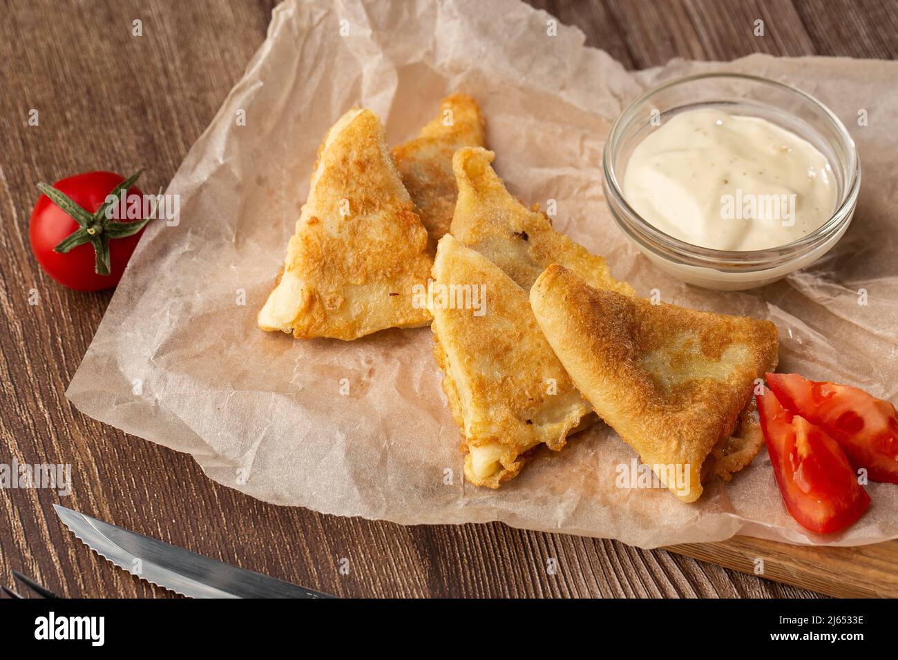 Savory Pancakes stuffed with Bolognese filling minced beef pepper garlic and with bechamel sauce