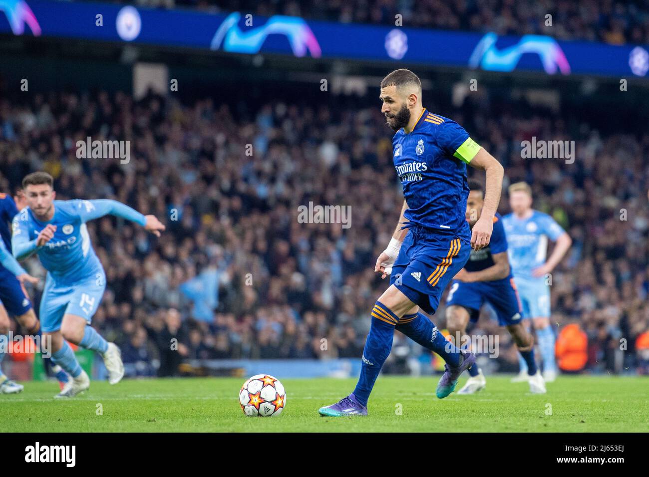 MANCHESTER, ENGLAND - APRIL 26: Karim Benzema of Real Madrid scoring he’s 2nd and he’s team 3rd goal during the UEFA Champions League Semi Final Leg One match between Manchester City and Real Madrid at City of Manchester Stadium on April 26, 2022 in Manchester, United Kingdom. (Photo by Sebastian Frej) Credit: Sebo47/Alamy Live News Stock Photo