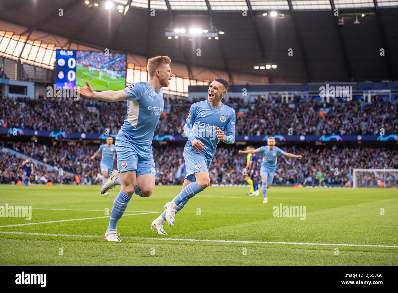 MANCHESTER, ENGLAND - APRIL 26: Kevin De Bruyne of Manchester City celebrates with Phil Foden after scoring 1st goal during the UEFA Champions League Semi Final Leg One match between Manchester City and Real Madrid at City of Manchester Stadium on April 26, 2022 in Manchester, United Kingdom. (Photo by SF) Credit: Sebo47/Alamy Live News Stock Photo