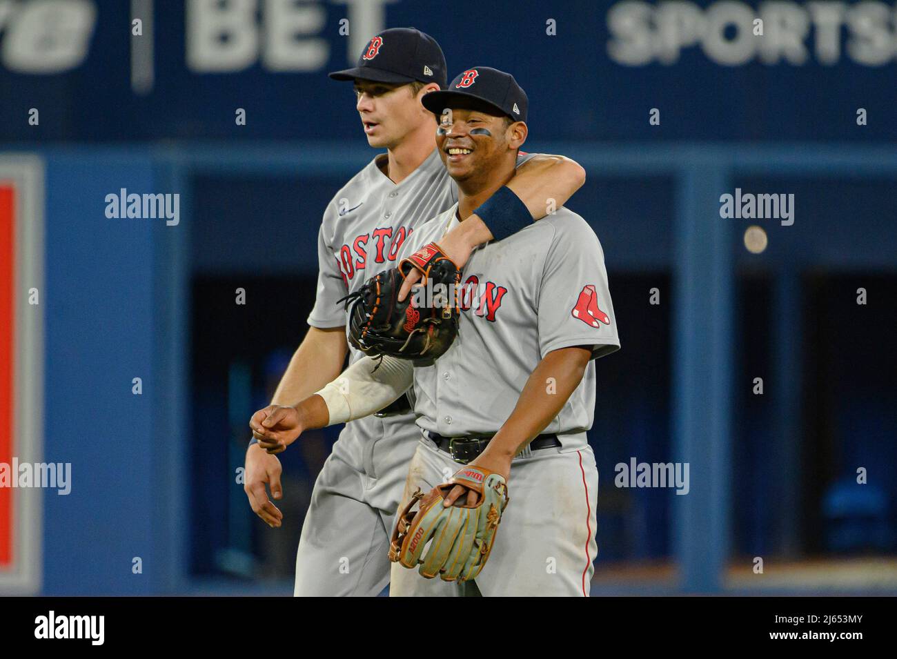 April 27, 2022, TORONTO, ON, CANADA: Boston Red Sox first baseman Bobby  Dalbec (29) and third baseman Rafael Devers (11) celebrate after defeating  the Toronto Blue Jays in MLB baseball action in
