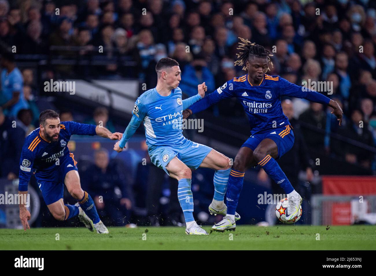 MANCHESTER, ENGLAND - APRIL 26: Eduardo Camavinga dribble ball around Phil Foden of Manchester City during the UEFA Champions League Semi Final Leg One match between Manchester City and Real Madrid at City of Manchester Stadium on April 26, 2022 in Manchester, United Kingdom. (Photo by SF) Credit: Sebo47/Alamy Live News Stock Photo