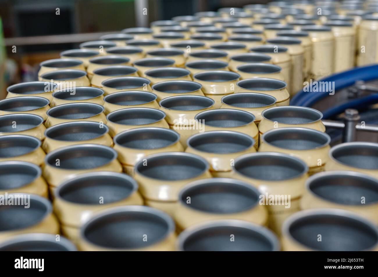 Many empty beer cans on the conveyor Stock Photo Alamy