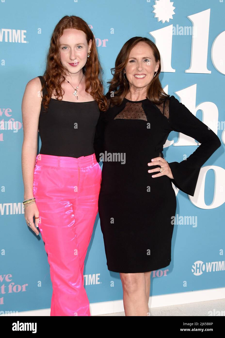 Los Angeles, USA. 27th Apr, 2022. Stella Shannon Chesnut and Molly Shannon walking on the red