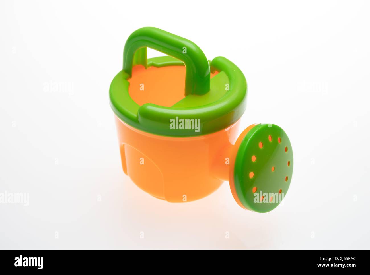 Child traditional beach plastic baby bucket toy isolated cutout on