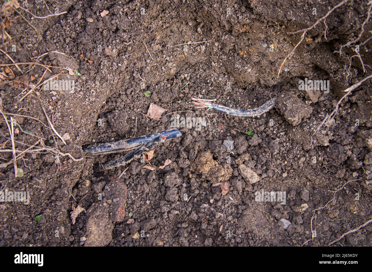 damaged underground cables when digging, snapped, broken power line cable, wiring, broken power