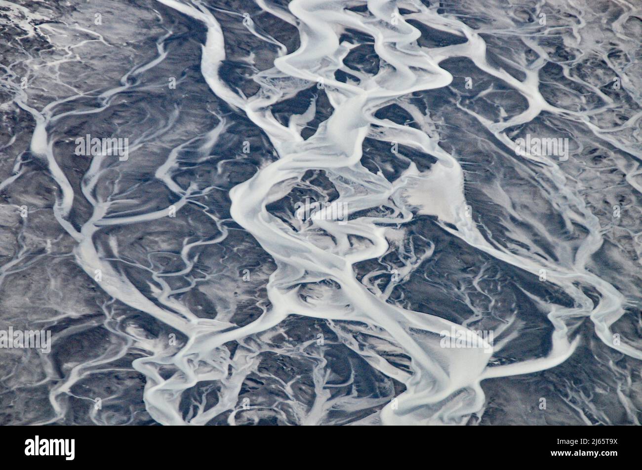 Mäandrierender Fletscherfluss - Luftaufnahme (Rundflug über das südliche Hochland, Island) - saerial photography of a glacier river in Iceland Stock Photo
