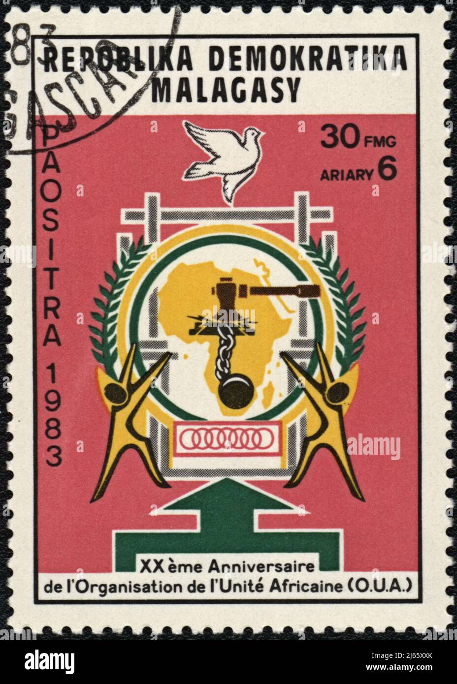 A stamp printed in Repoblika Demokratika Malagasy shows  XX Organisation of African Unity (OUA),  circa 1983 Stock Photo