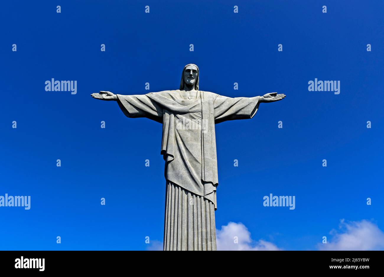 RIO DE JANEIRO, BRAZIL - MARCH 16, 2022: Christ the Redeemer and blue sky Stock Photo