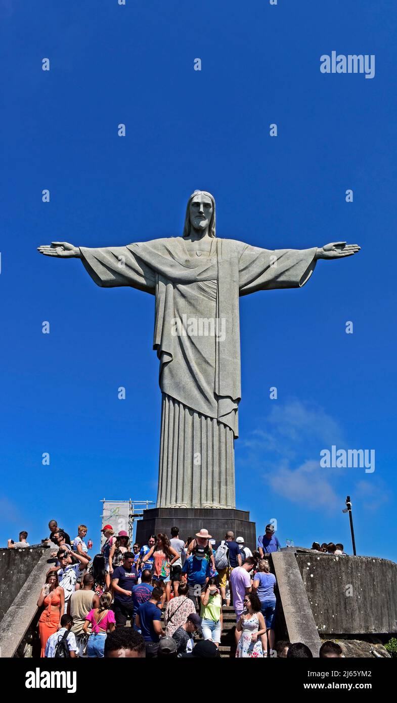 RIO DE JANEIRO, BRAZIL - MARCH 16, 2022: Christ the Redeemer and the tourists Stock Photo