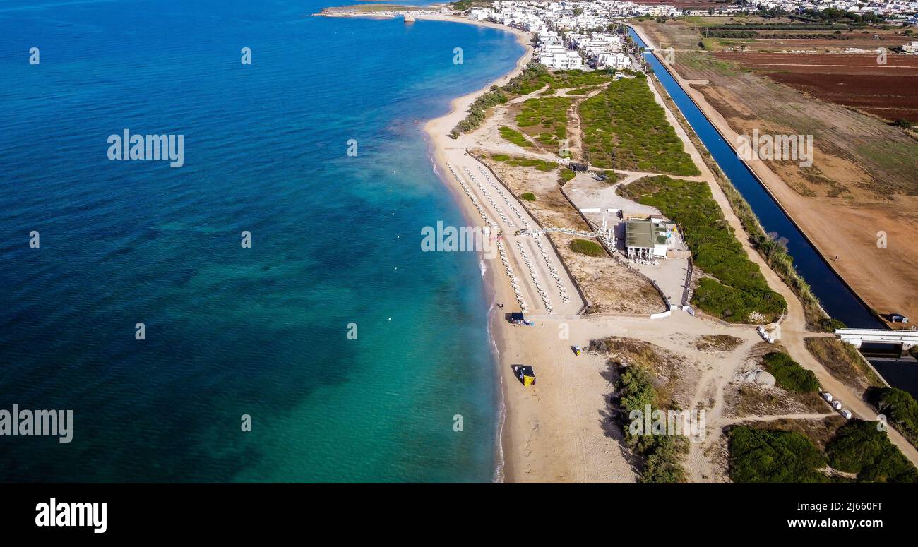 Famous beach of Salento in the Puglia region in southern Italy. The beach is considered the Maldives of Italy. The Maldives of Salento Stock Photo