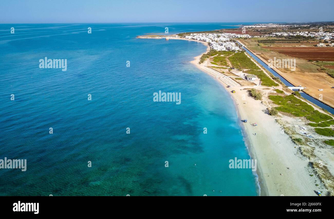 Famous beach of Salento in the Puglia region in southern Italy. The beach is considered the Maldives of Italy. The Maldives of Salento Stock Photo