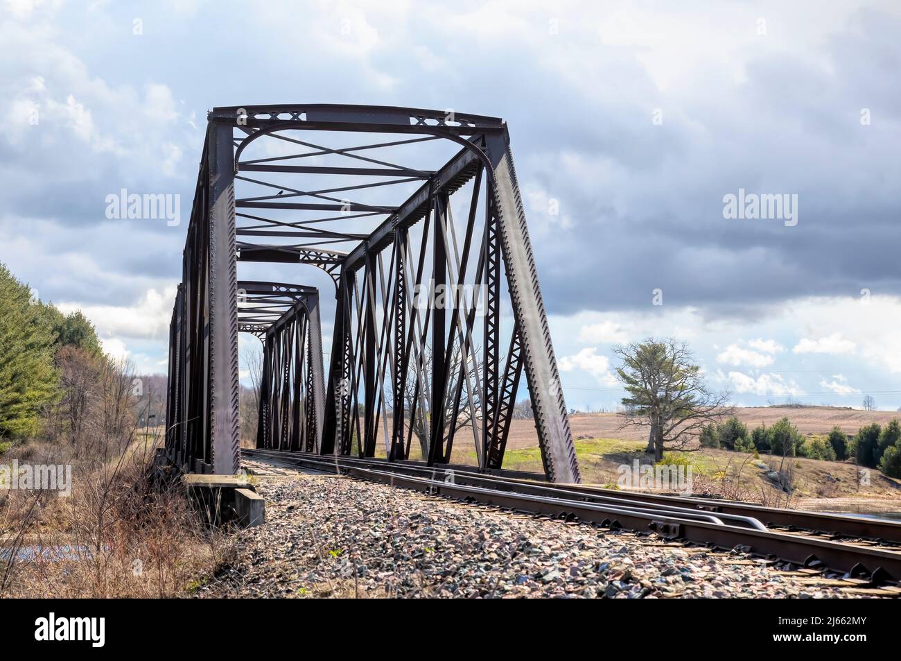 Double span riveted railway truss bridge built in 1893 crossing the