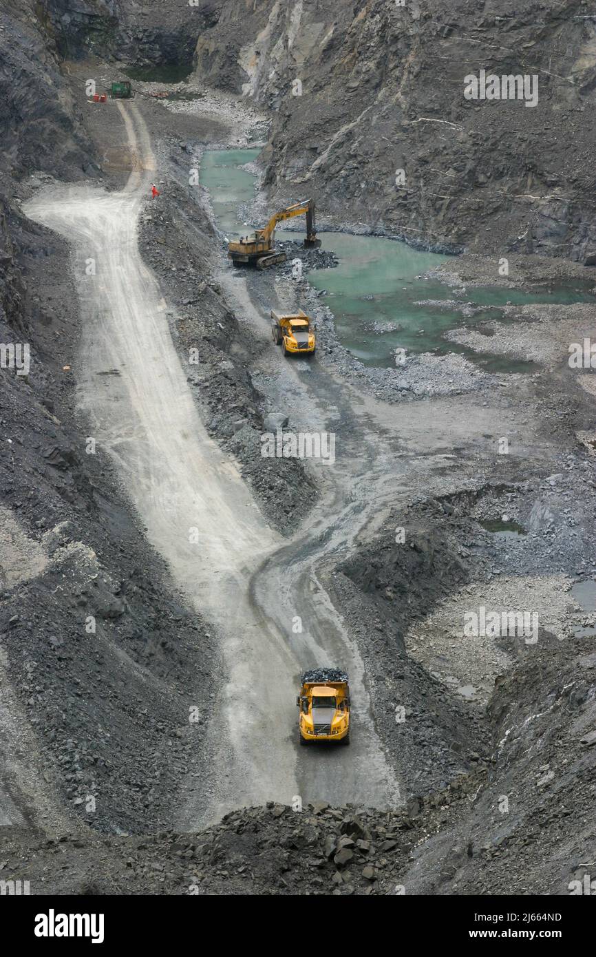 Ghana, Takoradi. Trucks of Manganese mining loaded with ore. The ore