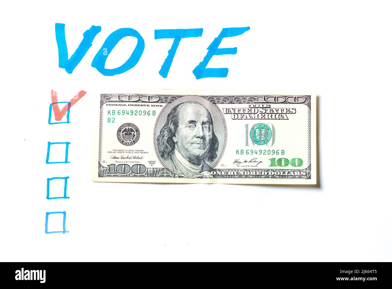 Buying votes of voters concept. Vote, dollars on a white background. Stock Photo