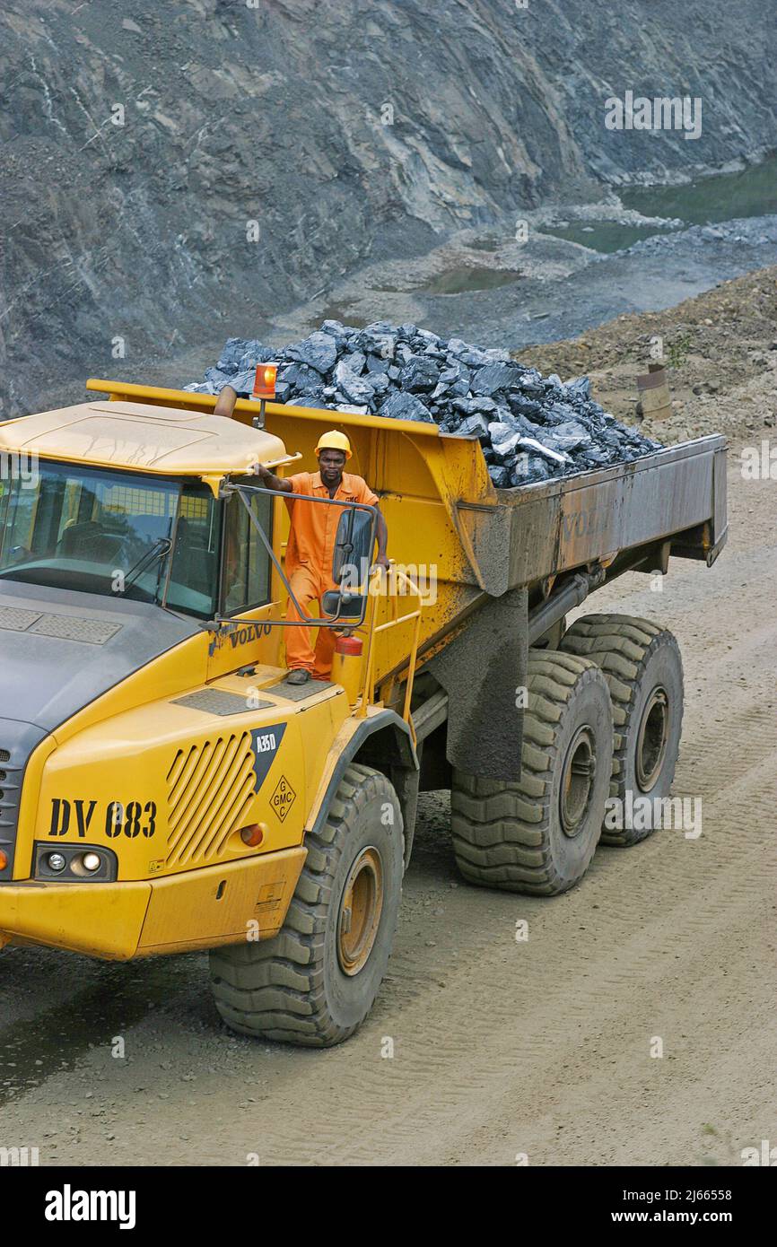 Ghana, Takoradi. Trucks of Manganese mining loaded with ore. The ore