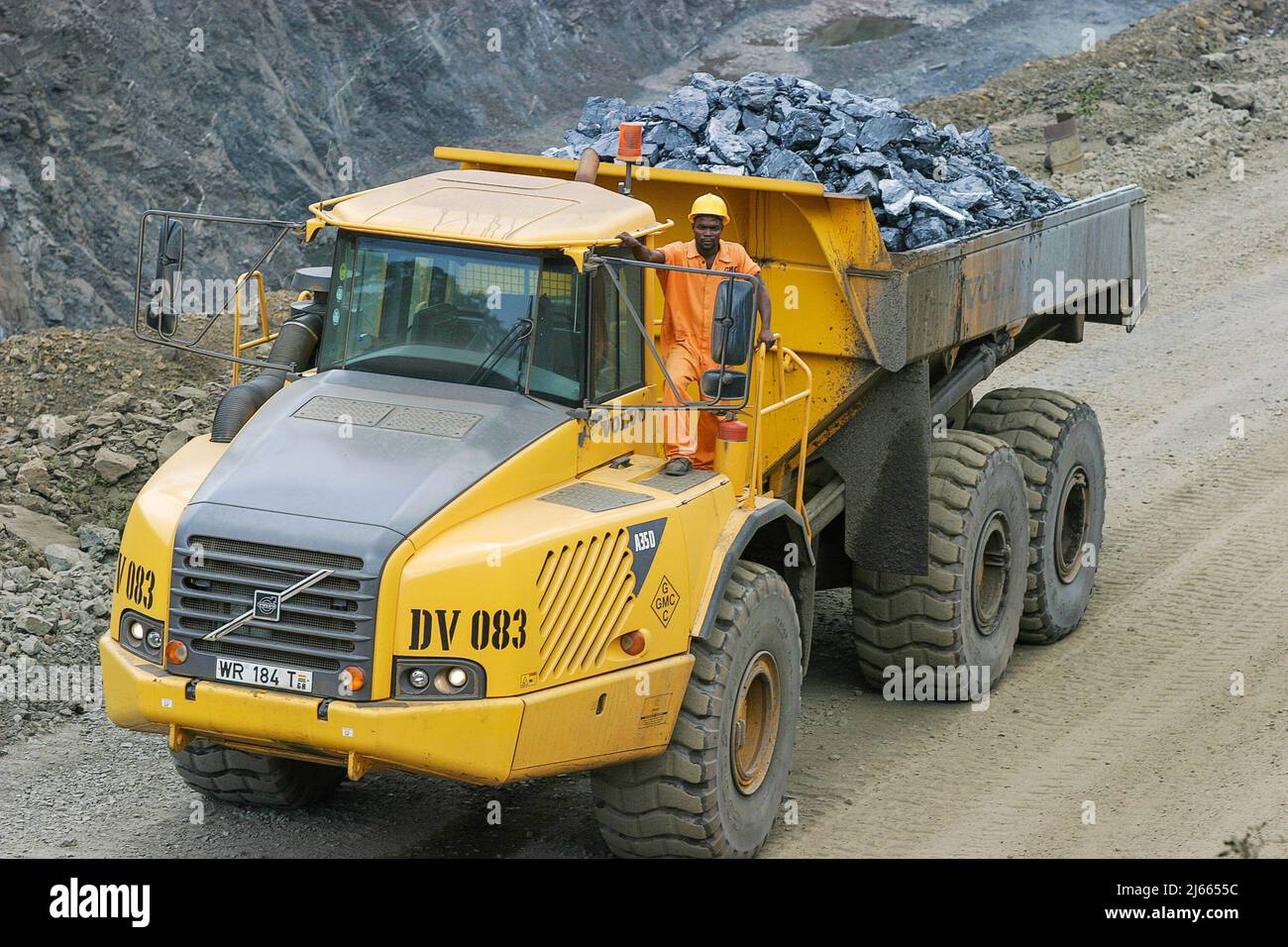 Ghana, Takoradi. Trucks of Manganese mining loaded with ore. The ore