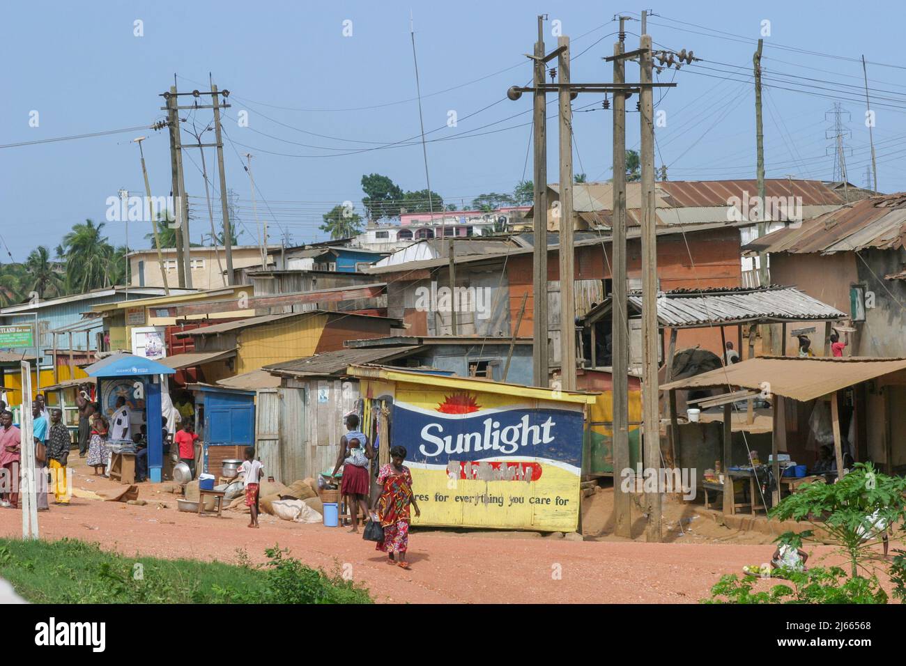 Ghana, electricity poles in and around a slum in the city Takoradi