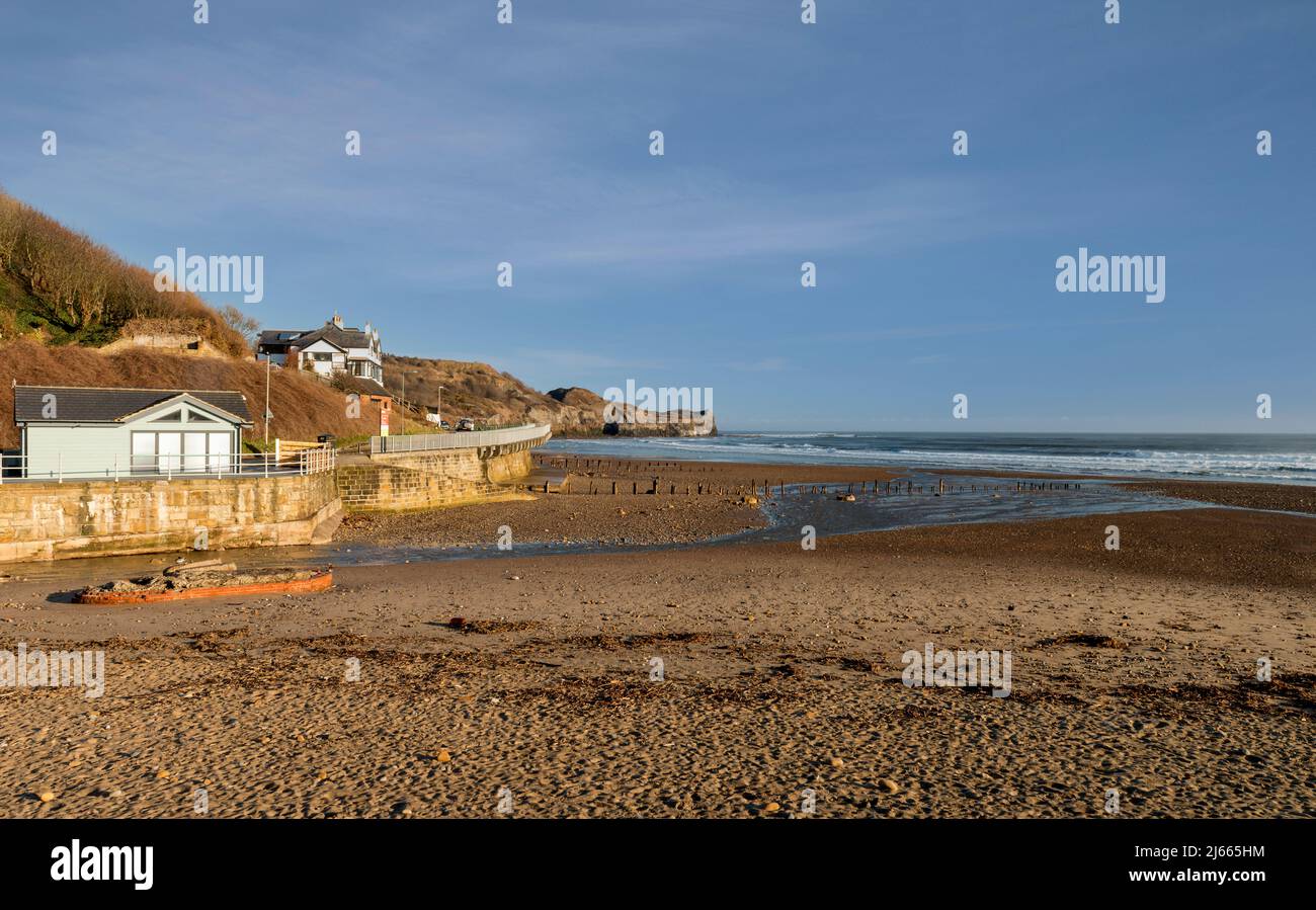 The beach at Sandsend near Whitby on a bright, sunny day Stock Photo