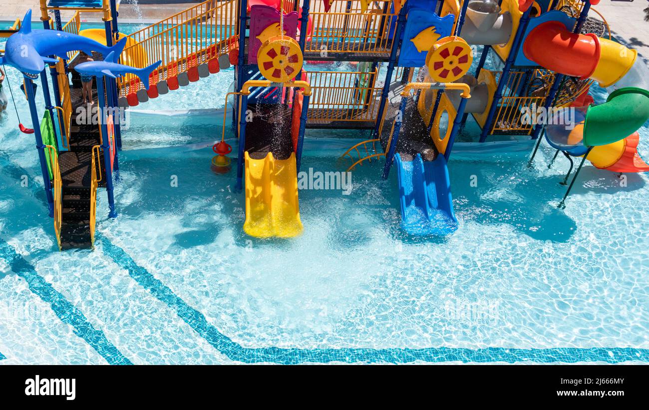 Children Playground with Colorful Yellow And Blue Plastic Slider in