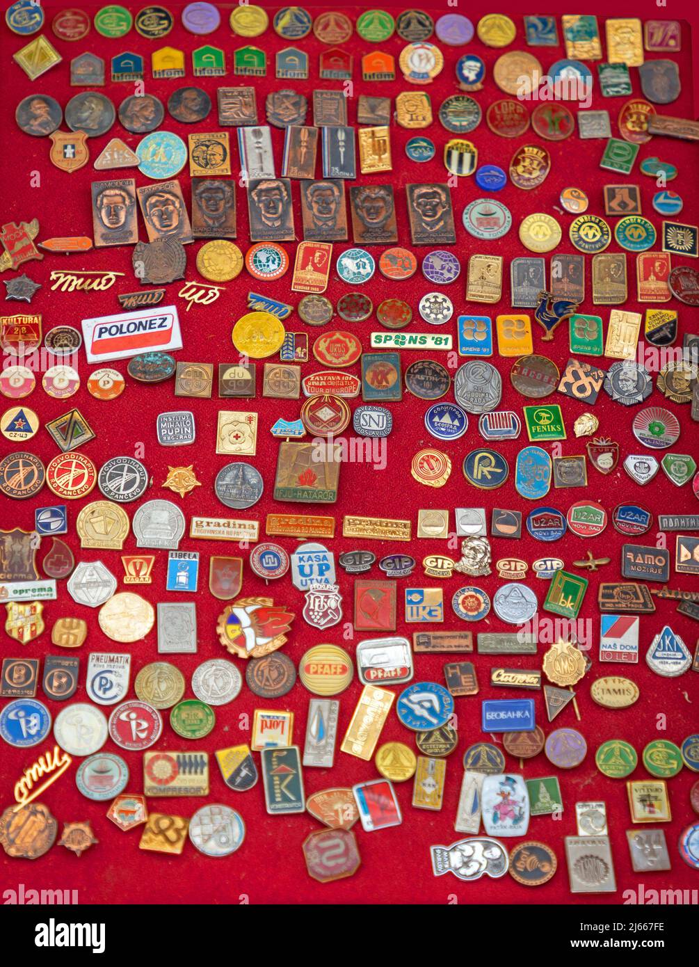Belgrade, Serbia - July 25, 2021: Old retro pin badges collectible items memorabilia sold on flea market in Belgrade for collectors. Stock Photo