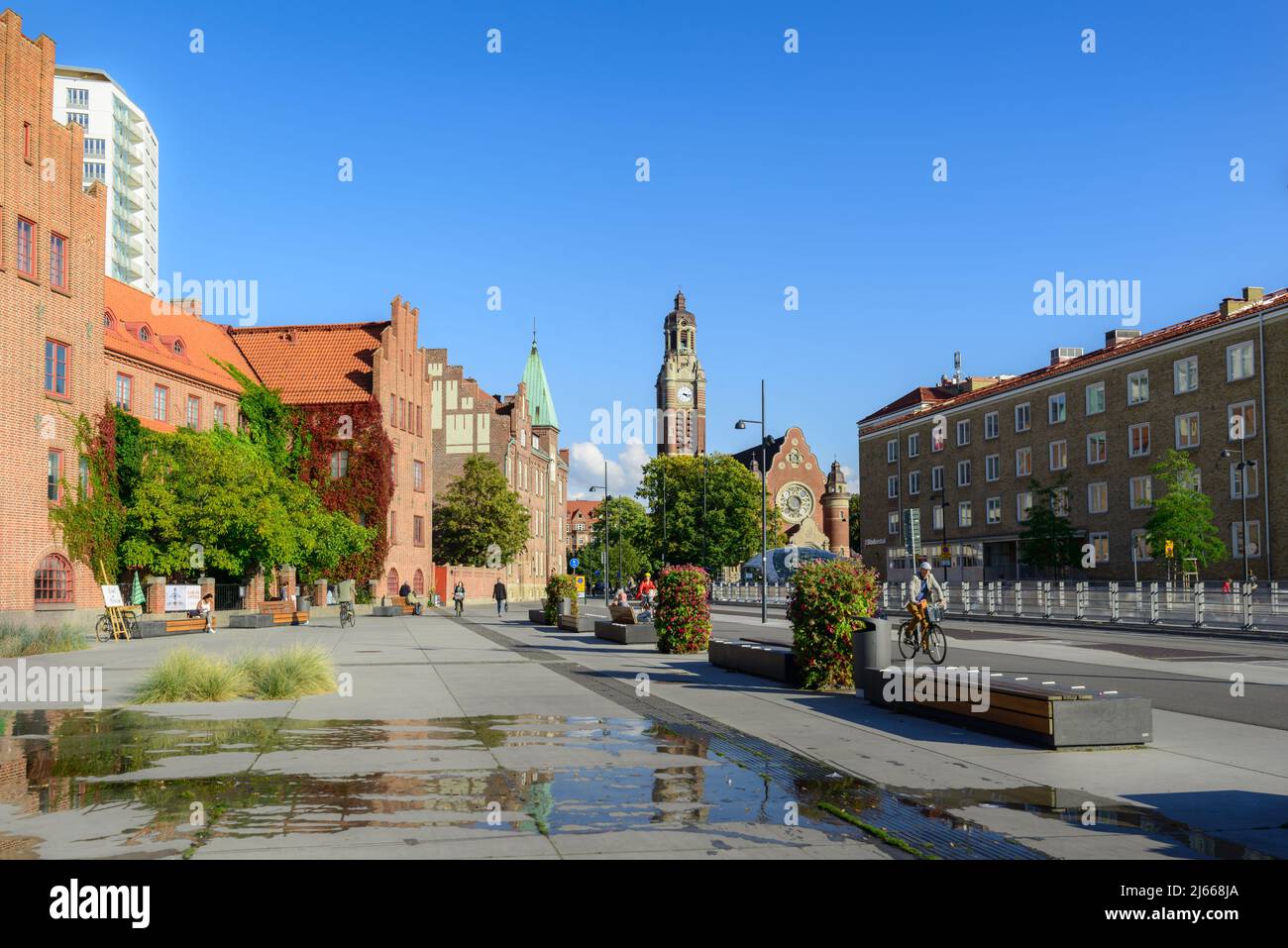 View from small square near Magistratsparken and Hantverkshuset to St. John's Church and Triangeln station. Stock Photo