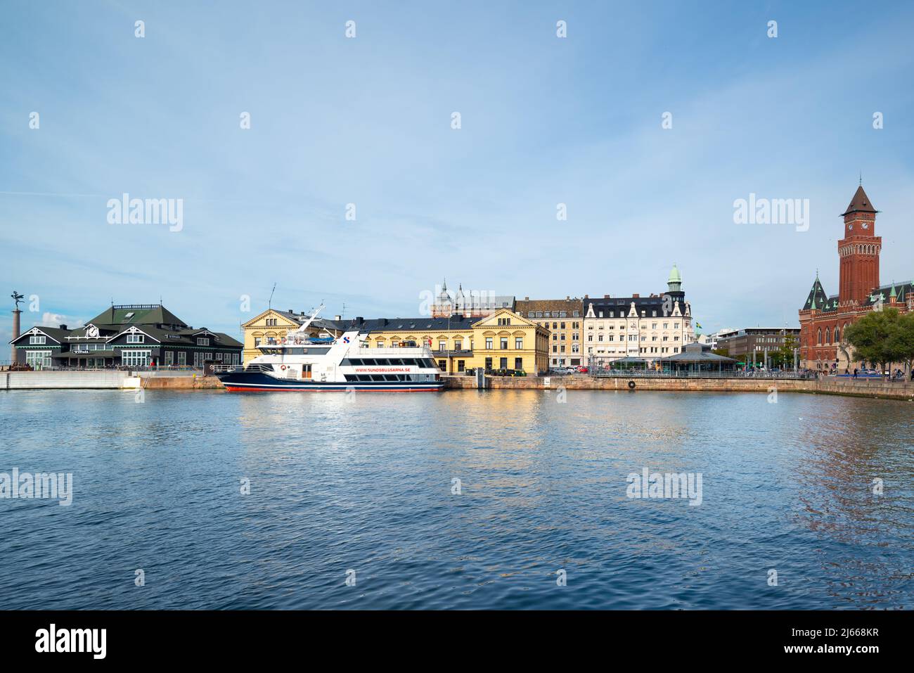 View of the city and the port from sea. The ferry ship is in the port, Helsingborg City Hall-Radhuset Stock Photo