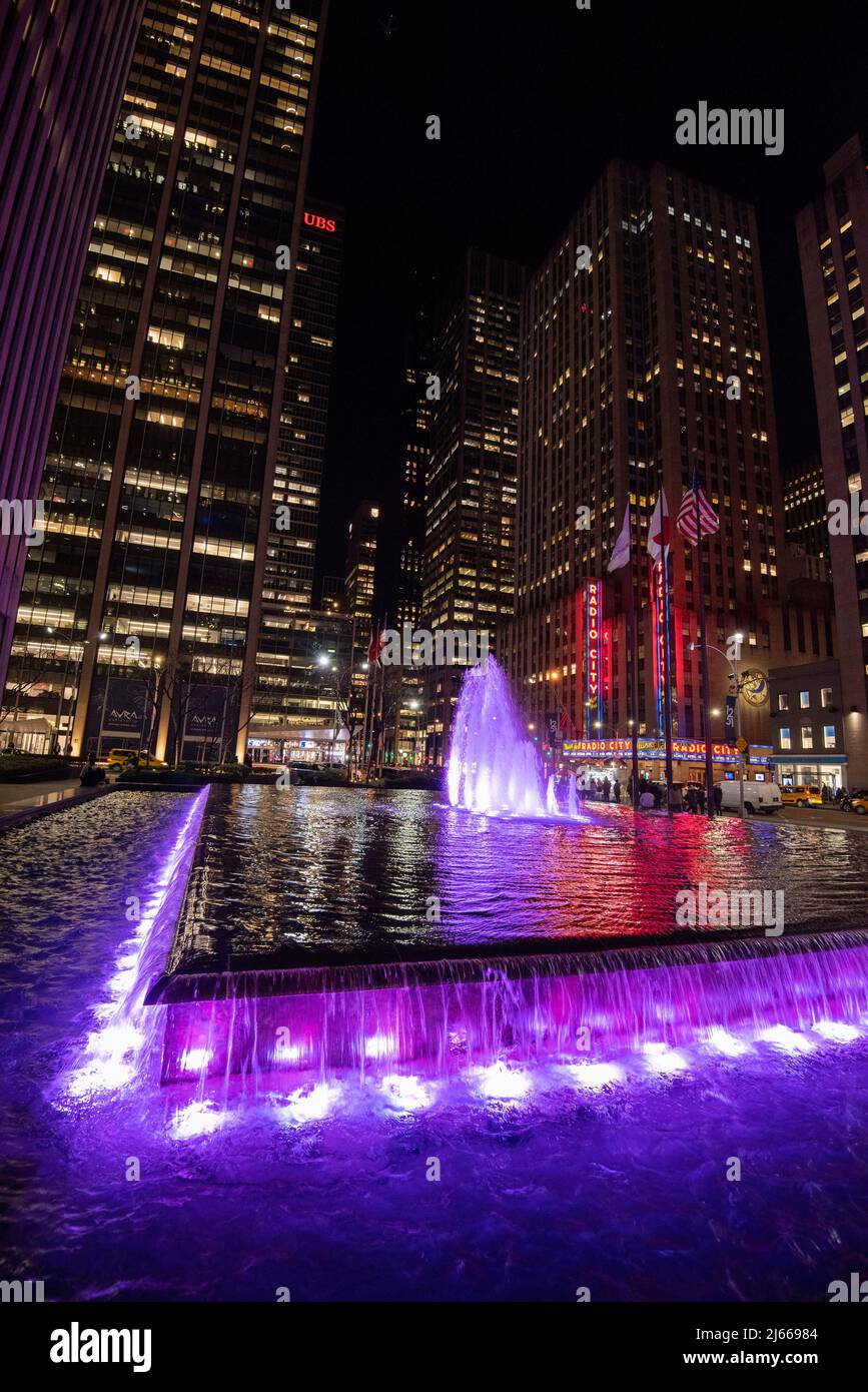 Christmas Ball Fountain and Radio City Music Hall at Night in Manhattan