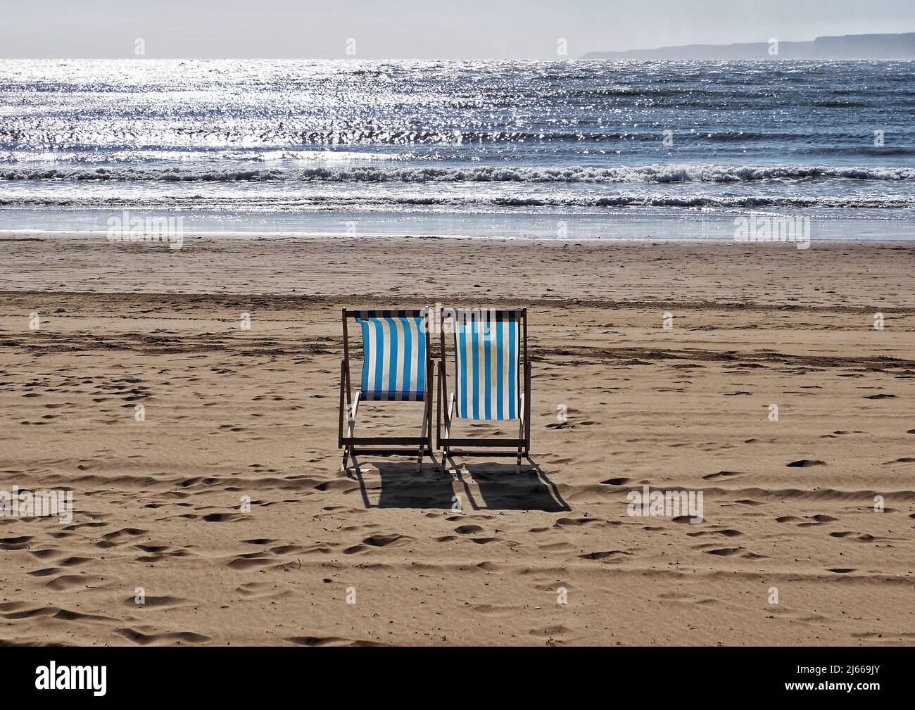 Empty deckchairs on the beach Stock Photo
