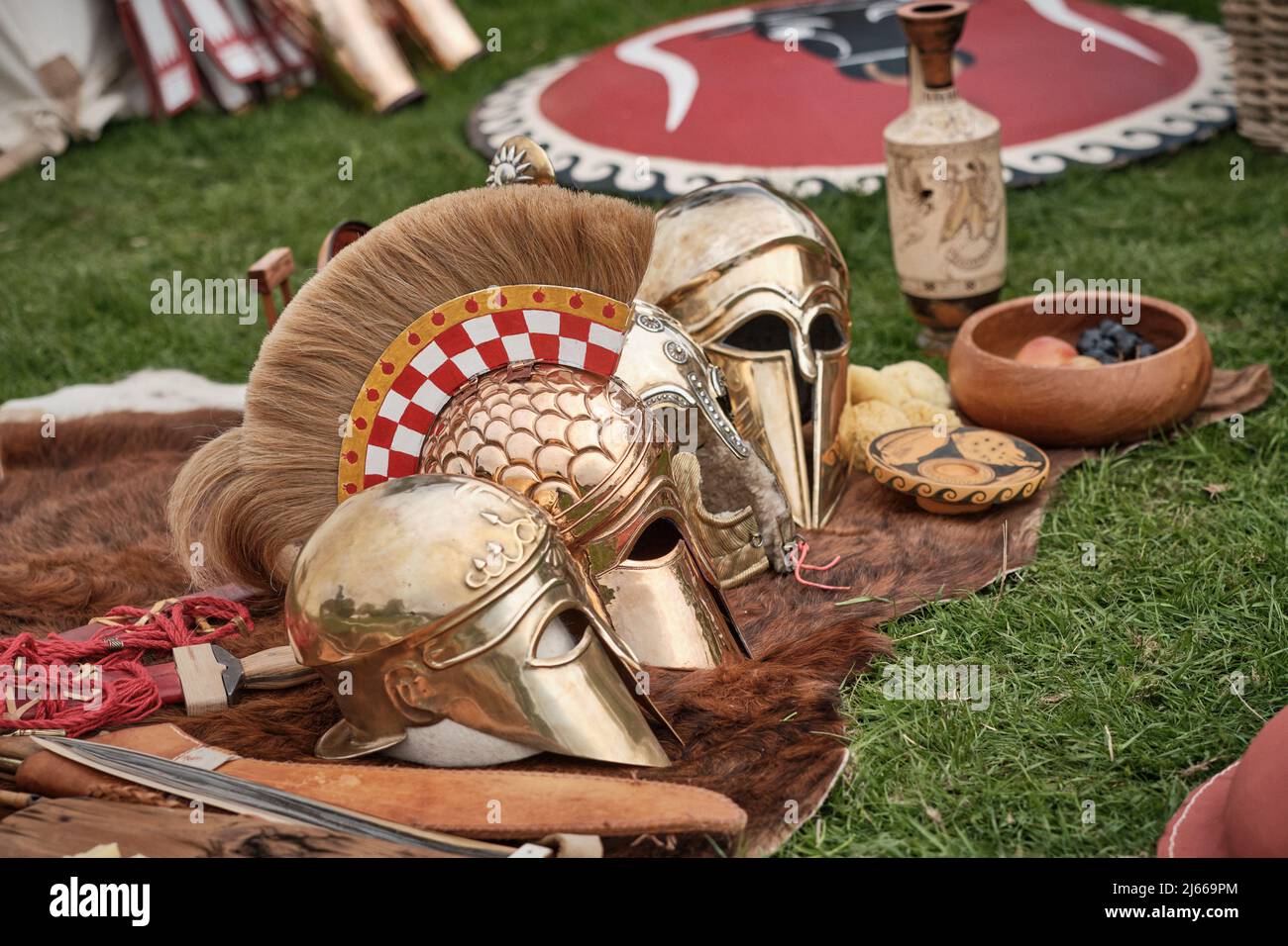 A display of Ancient Greek armour and weaponry at the No Man's Land Event at Bodrhyddan Hall, Wales Stock Photo