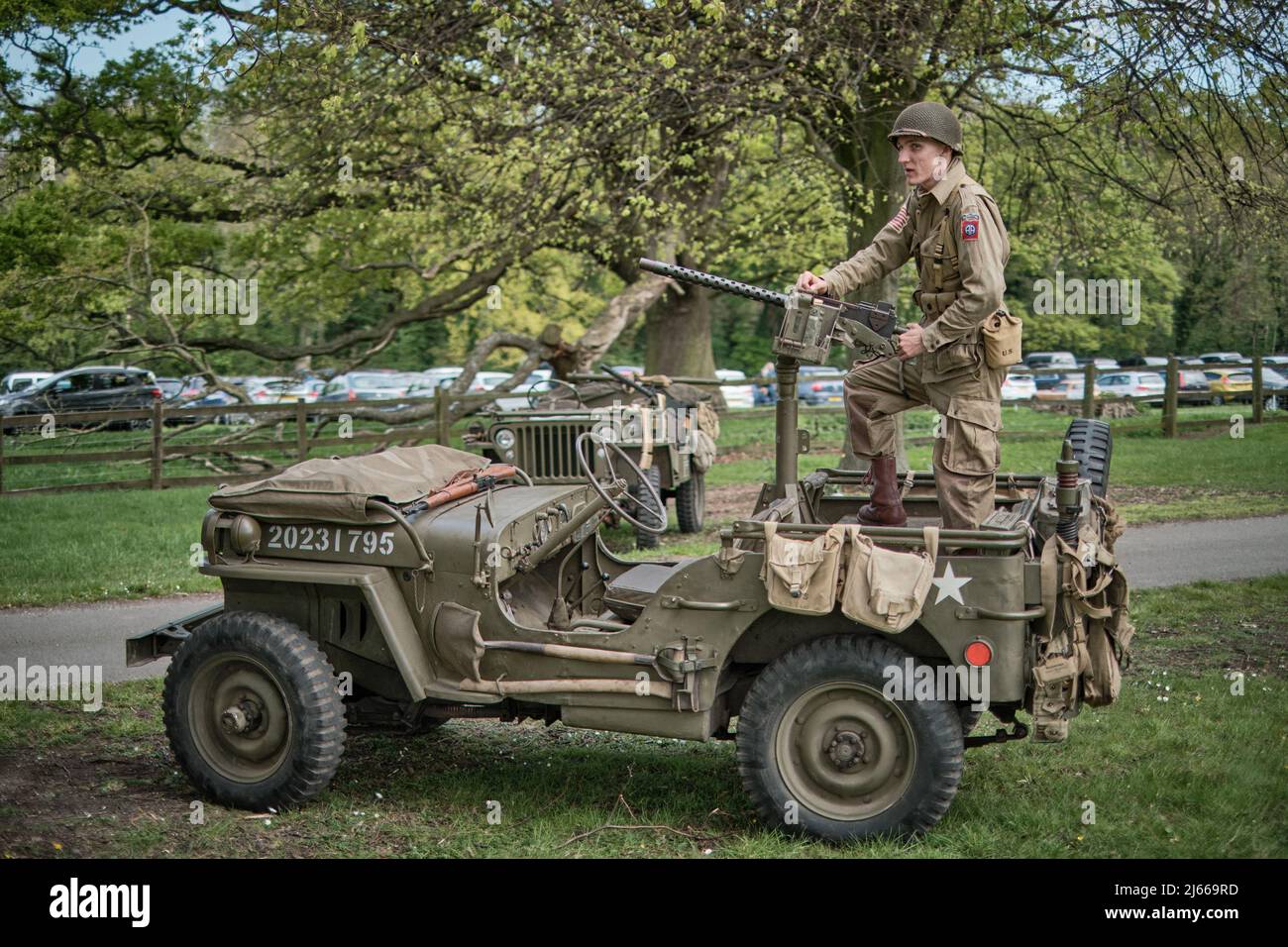 American Airborne re-enactors in Jeeps guard a checkpoint at the entrance to the No Man's Land 2022 event at Bodrhyddan Hall, Wales Stock Photo