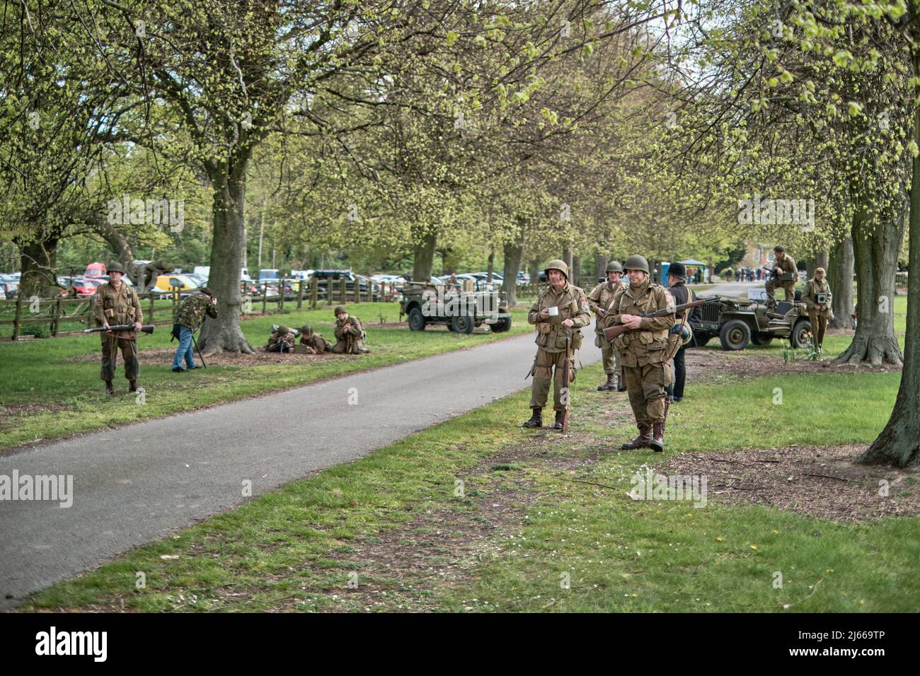 British police and American Airborne re-enactors create a checkpoint at the entrance to the No Man's Land 2022 event at Bodrhyddan Hall, Wales Stock Photo