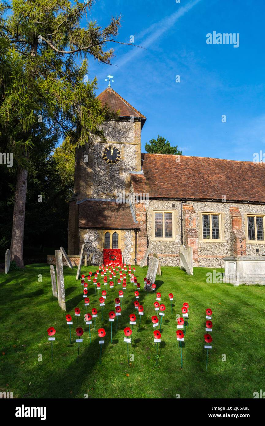 Commemorative poppies in the churchyard of St. Giles the Abbot church, Farnborough, Kent, England Stock Photo
