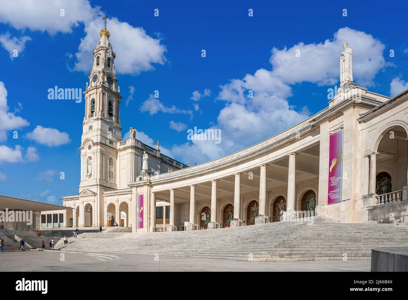 Fatima, Portugal - november 13 2022 - People passing the square in front of the Basilica of Our Lady of the Rosary of Fatima Stock Photo