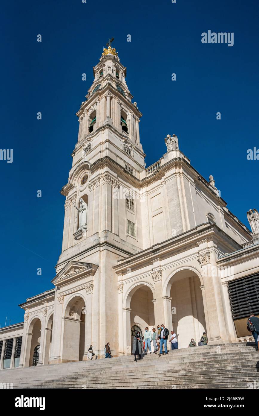 Fatima, Portugal - november 13 2022 - People leaving and entering the Basilica of Our Lady of the Rosary of Fatima Stock Photo