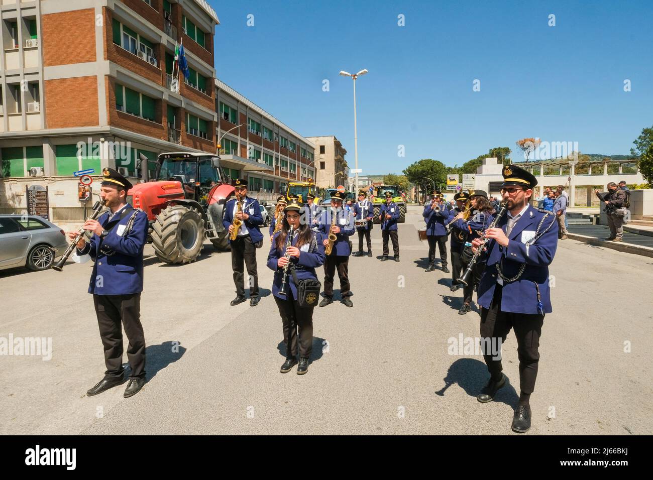 The Coordinamento Unitario in Difesa del Patrimonio Bufalino (United Coordination in Defence of the Bufalino Heritage) staged a funeral procession with tractors, a band and coffin to protest against the slaughter of 140,000 animals since 2014 for allegedly having contracted brucellosis, in front of the local health authority of caserta Stock Photo