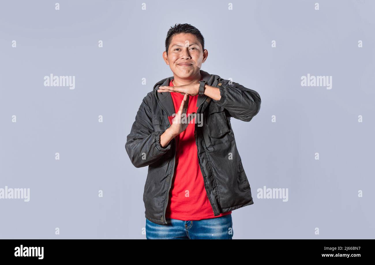 Man making time out gesture, latin guy making time out gesture Stock Photo