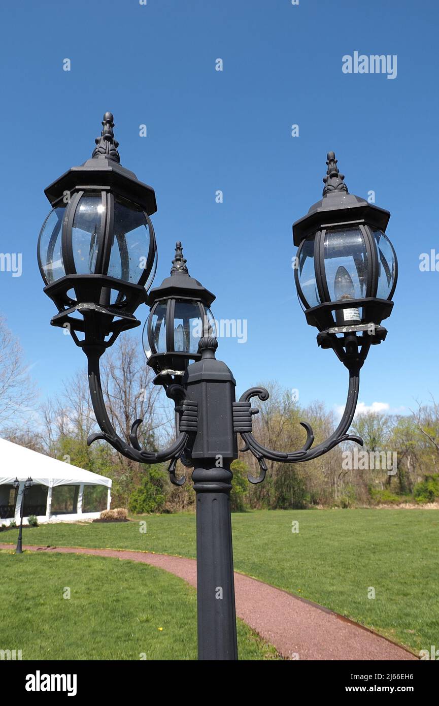 The lamp post has 3 lights Stock Photo Alamy