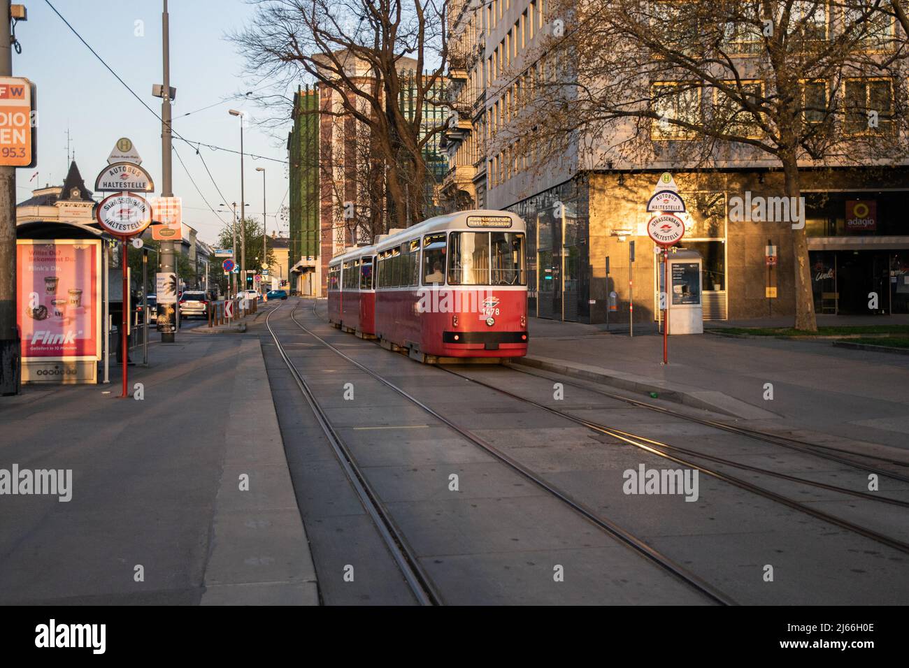 urban trolley bus running along the Vienna ring during sunset Stock Photo