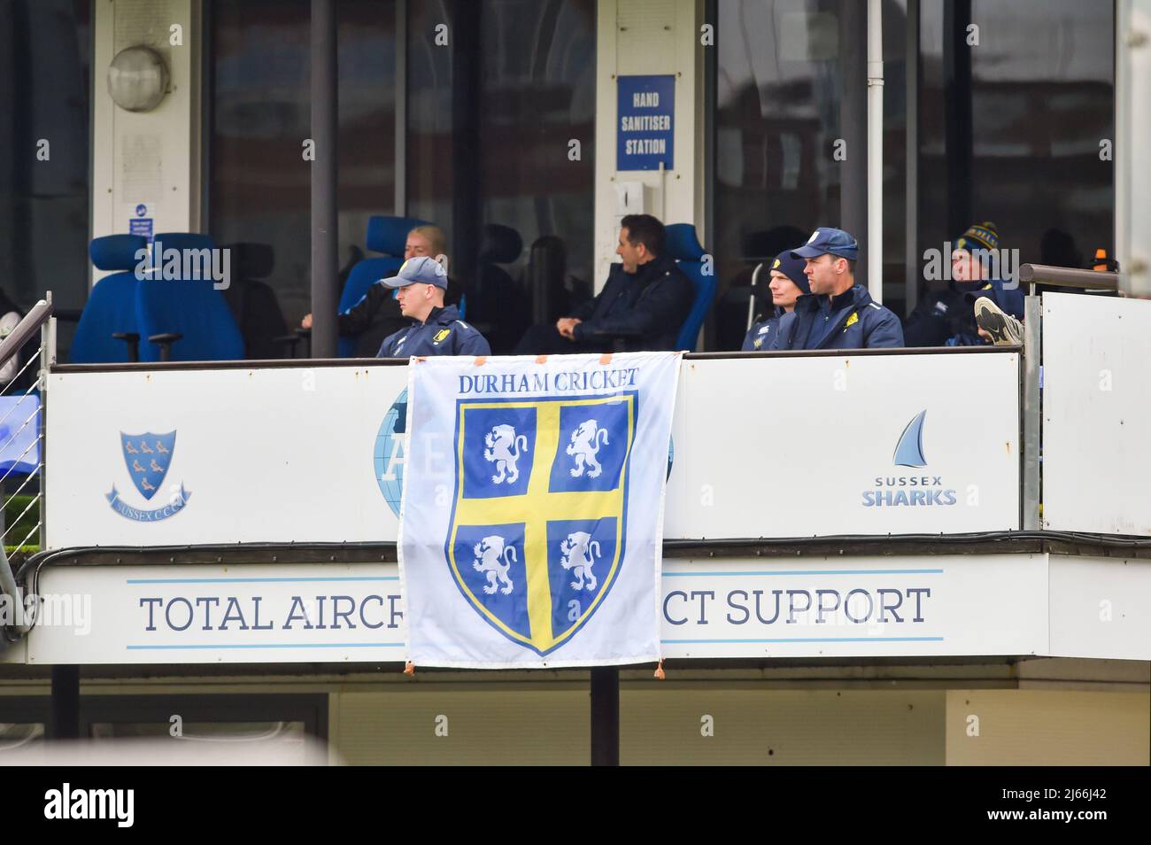 Hove UK 28th April 2022 - Members of the Durham team watch from the balcony y as they take on Sussex on the first day of their LV= Insurance County Championship match at The 1st Central County Ground  in Hove . : Credit Simon Dack / Alamy Live News Stock Photo