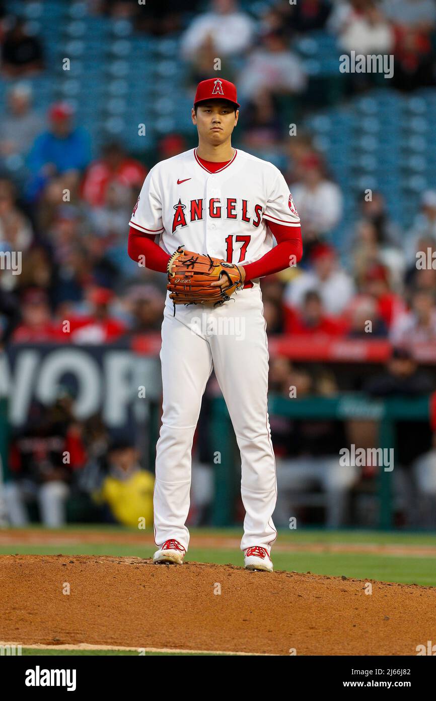 Los Angeles Angels pitcher Shohei Ohtani (17) prepares to pitch the ball during an MLB regular season game against the Cleveland Guardians, Wednesday, Stock Photo