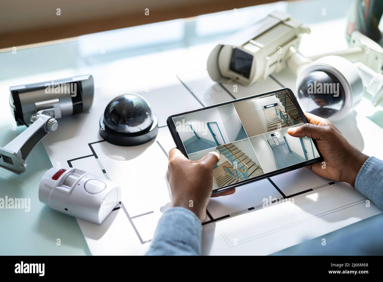 CCTV Security Alarm And Fire Surveillance On Tablet Stock Photo