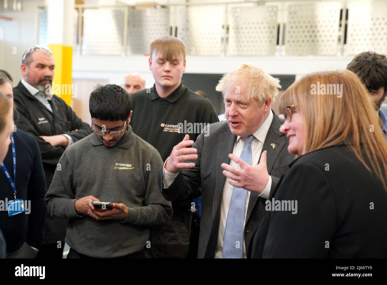 Prime Minister Boris Johnson meets students during a campaign visit to Burnley College Sixth Form Centre in Burnley, Lancashire. Picture date: Thursday April 28, 2022. Stock Photo