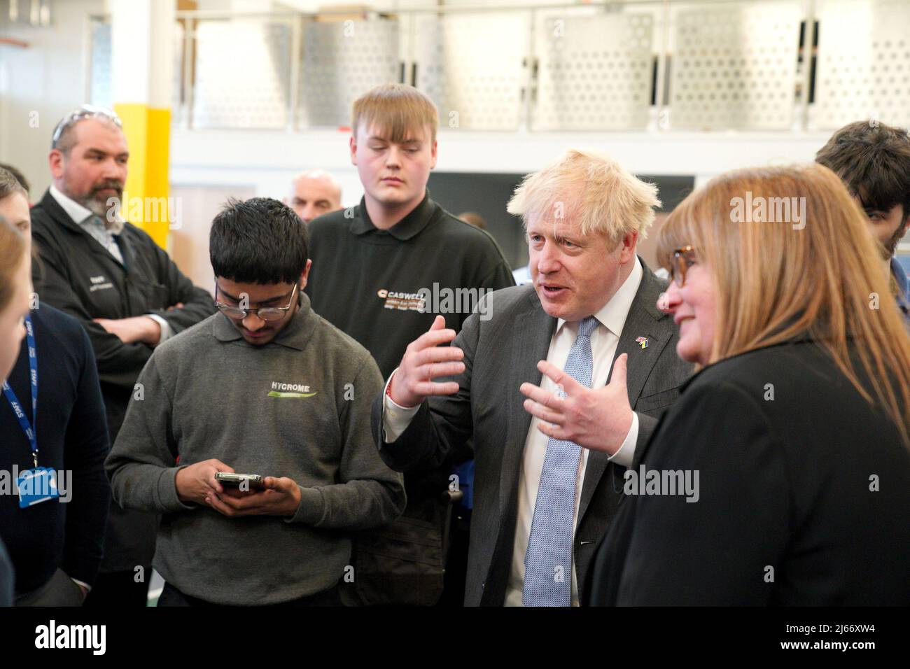 Britain's Prime Minister Boris Johnson meets students during a campaign visit to Burnley College Sixth Form Centre in Burnley, Lancashire, Britain April 28, 2022. Peter Byrne/Pool via REUTERS Stock Photo