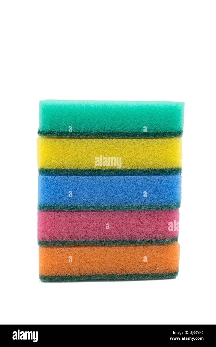 Multi-colored sponges for household work from foam rubber, stack, on a white background. Stock Photo