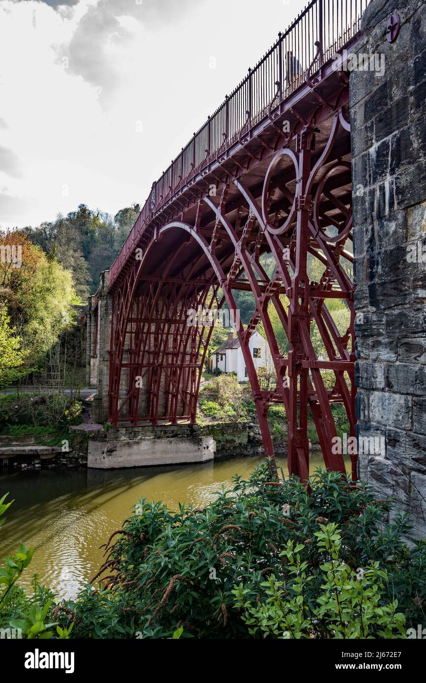 The Iron Bridge is a cast iron arch bridge that crosses the River Severn in Shropshire, England. Opened in 1781,The first major bridge from cast iron. Stock Photo