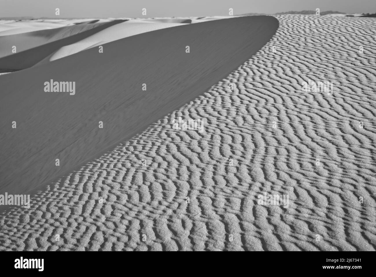 Black and white photograph of the gypsum sand dunes in White Sands